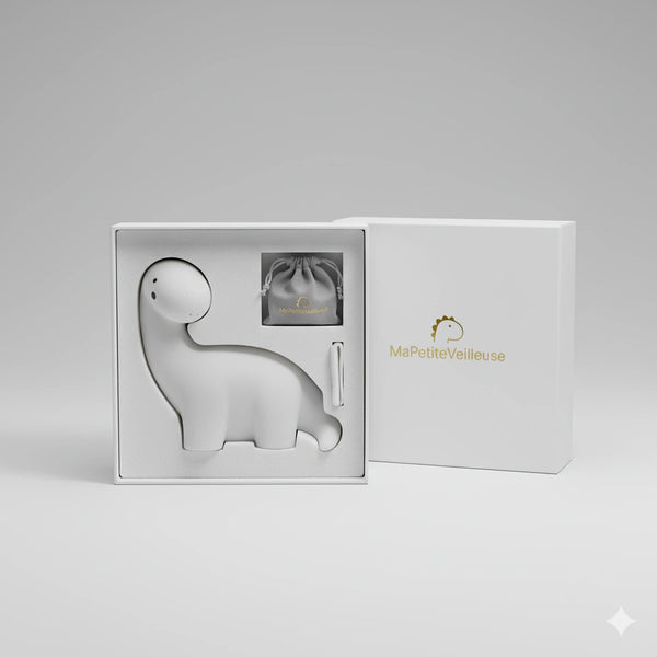 Packaging élégant et premium pour la veilleuse bébé dinosaure long cou, idéal pour un cadeau de naissance ou d'anniversaire.