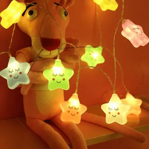 Veilleuse enfant étoile multicolore avec guirlande lumineuse, ambiance chaleureuse et ludique pour chambre bébé
