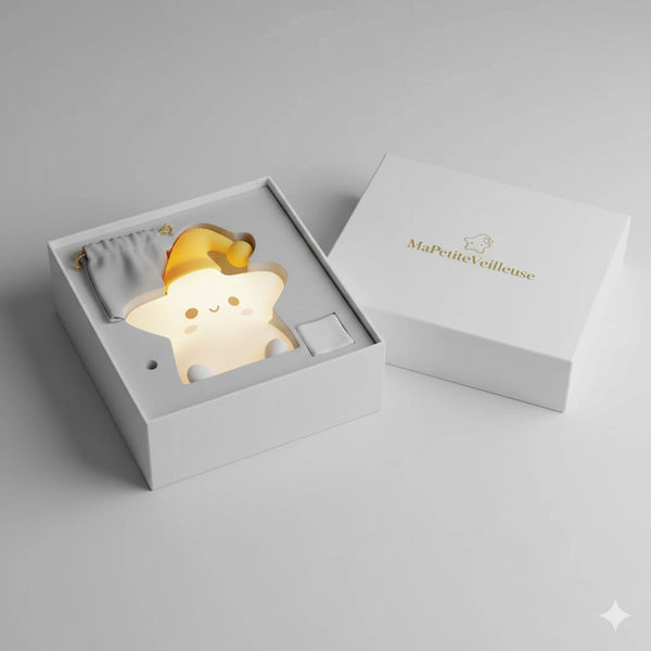 Packaging élégant et premium pour veilleuse bébé étoile, idéal pour un cadeau de naissance ou d'anniversaire.